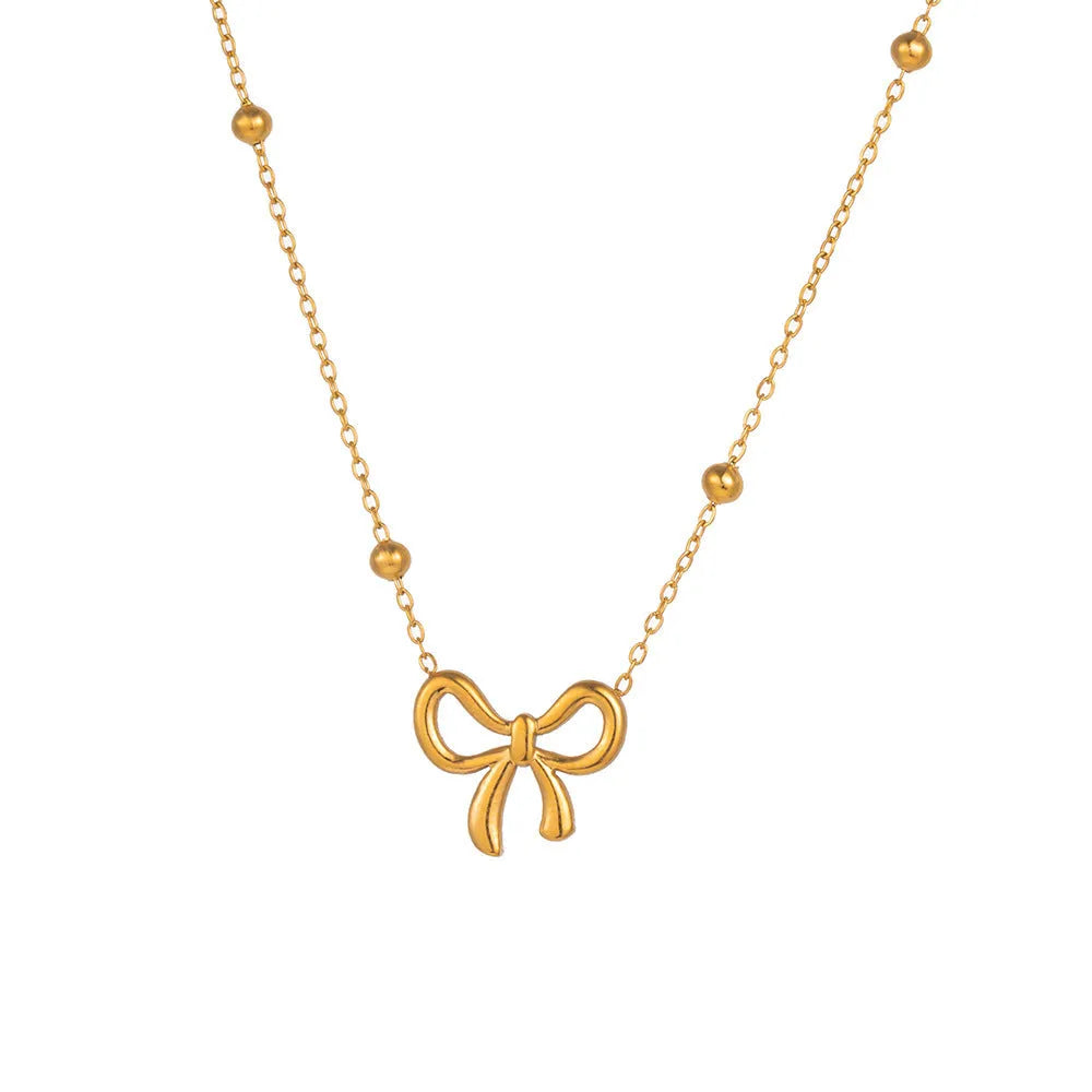 Gold electroplated bow necklace for women with titanium steel chain and adjustable length