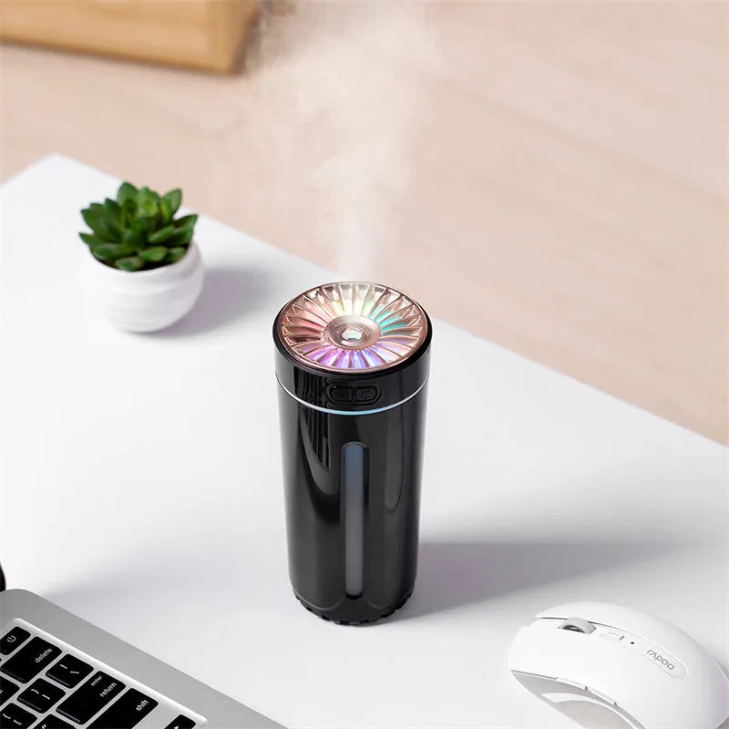 Black portable humidifier with LED lights showing dimensions and USB charging port