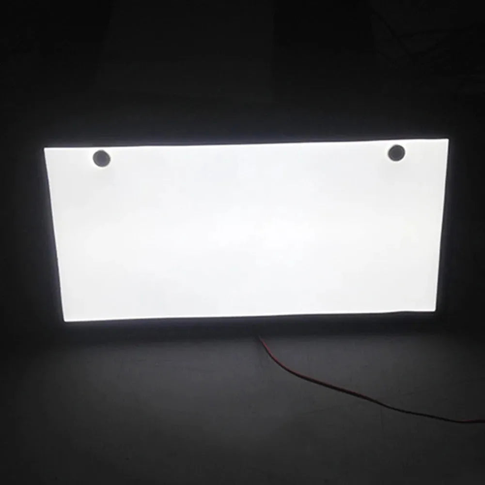 Two white LED truck licence plate light units, showing flat thin design with multiple LED beads.