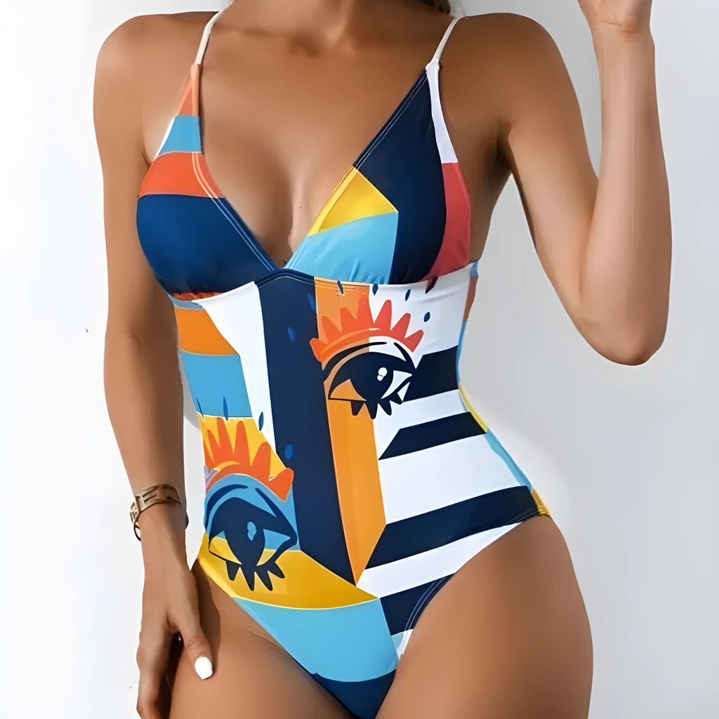 Plus size solid blue one-piece swimsuit with a backless design on a mannequin.