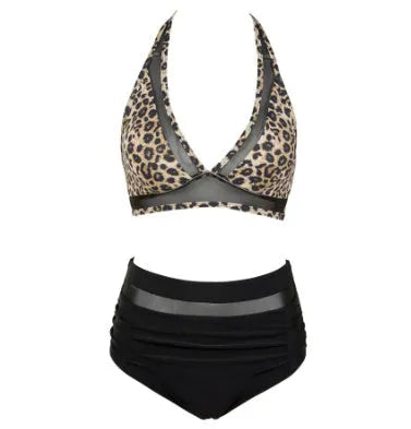 Women's black polyester bikini swimsuit top and briefs laid flat