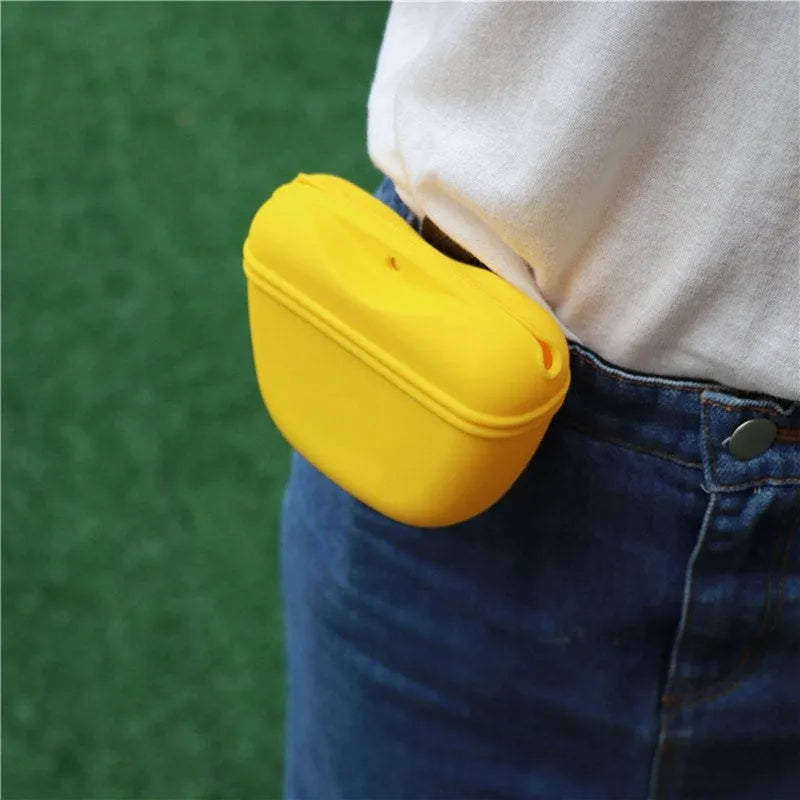 Silicone clip-on dog treat waist bag in colour choice, showing magnetic closure and belt clip.