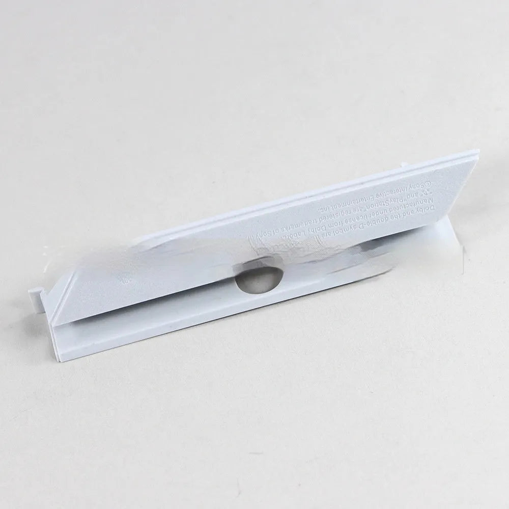 A black plastic hard drive baffle bin cover for a 3.5-inch PC case bay.
