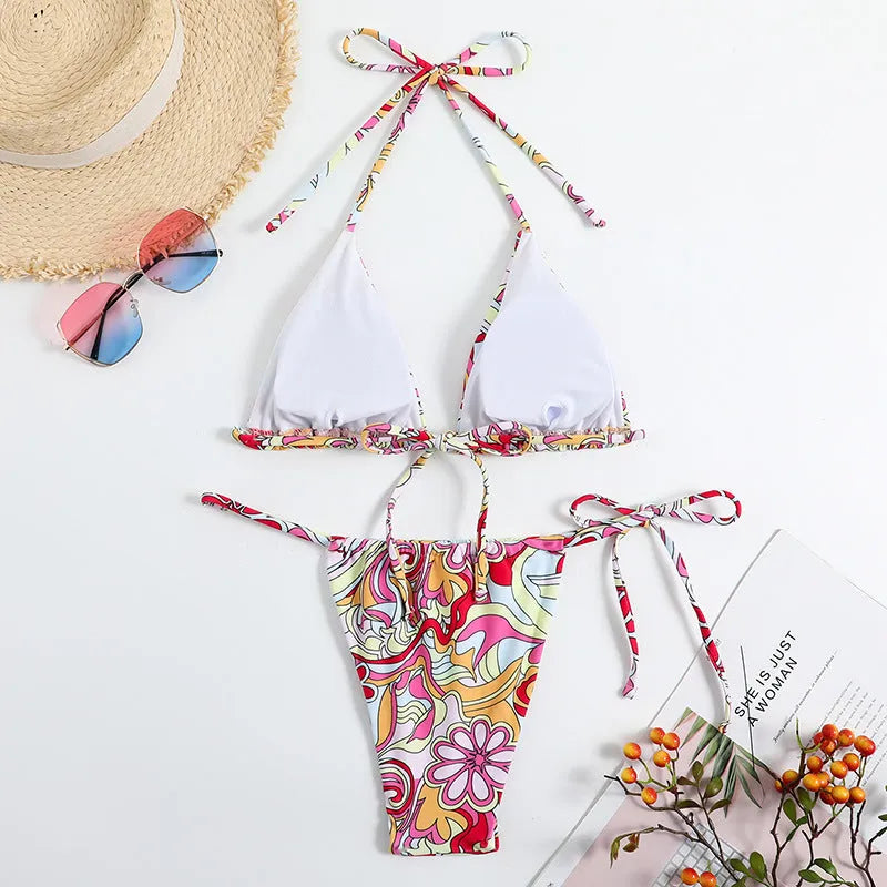 Women's triangle printed bikini swimsuit with adjustable hanging neck strap on polyester fabric