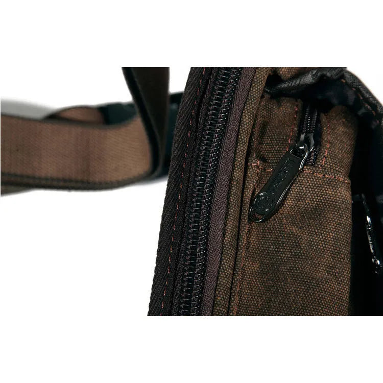 Men's wear-resistant canvas belt bag in black with leather accents and high-precision hardware, 28x14.5x5cm.
