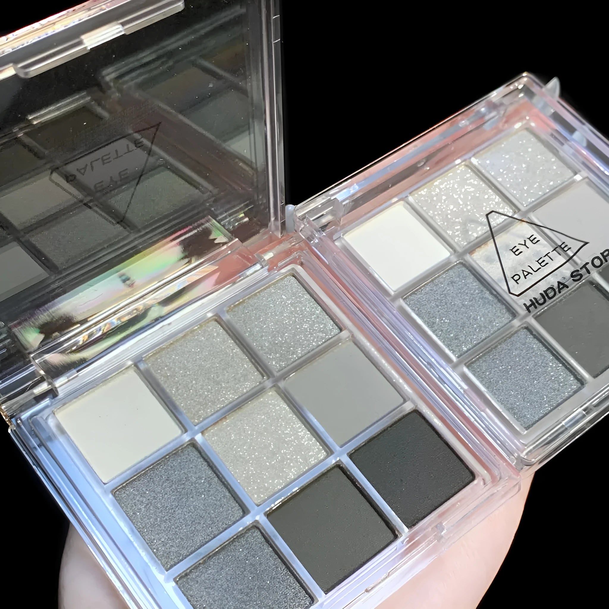 CZ0069 9-colour smoked eyeshadow palette compact showing white, silver, black, and iron grey shades.