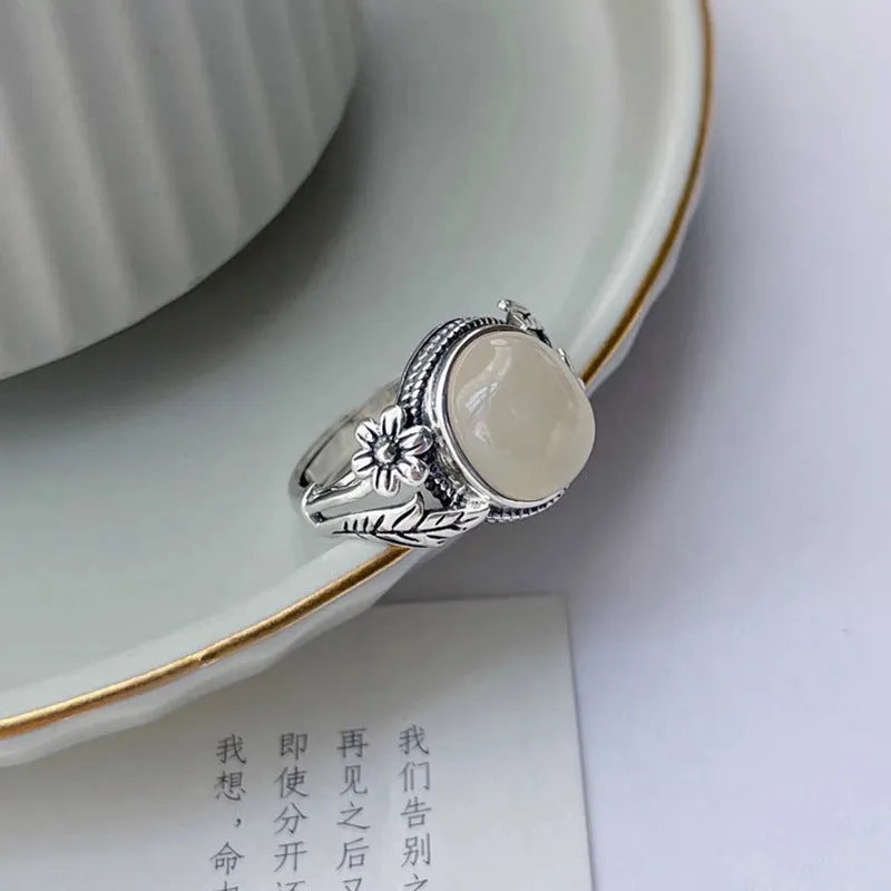 Copper vintage ring with adjustable opening and imitation white chalcedony stone