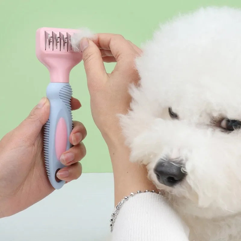Pet grooming comb with stainless steel knot knife teeth and pink handle for detangling matted fur