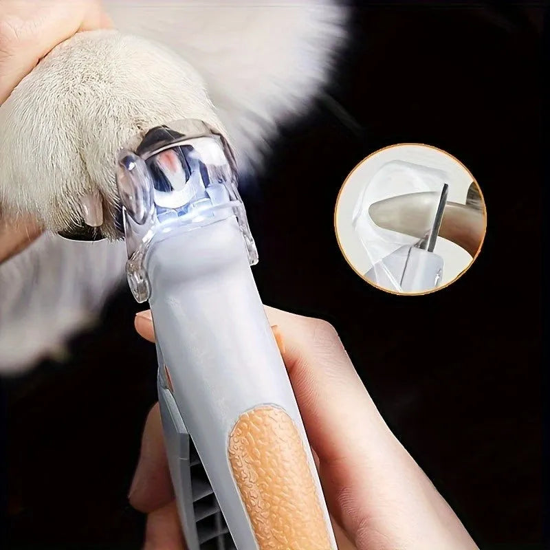 Yellow LED pet nail trimmer with magnifying glass and light for trimming cat and dog nails.