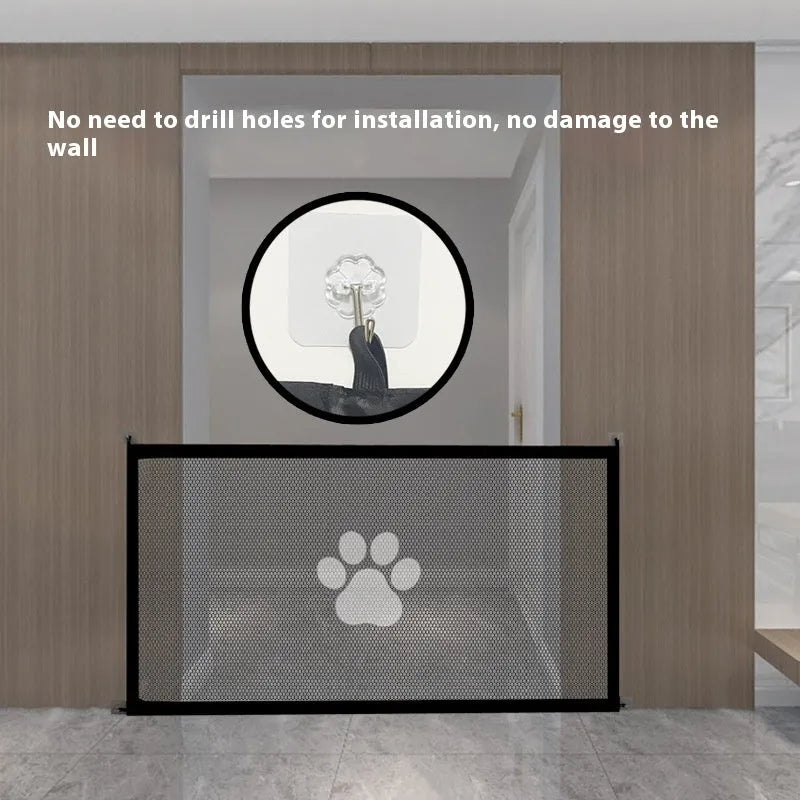 Folding cloth dog barrier net with pet doorsill showing black dog footprint design, shown in a doorway.