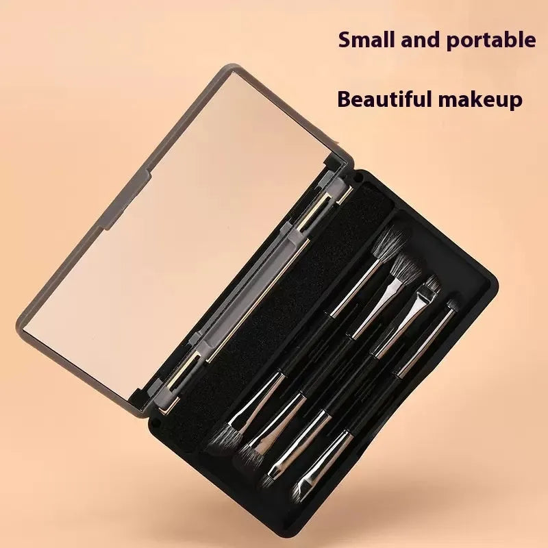Makeup brush set with mirror showing eyeshadow brushes with artificial fibre bristles