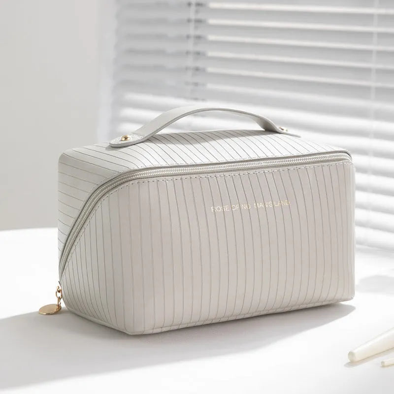 Vertical pattern pillow makeup bag in cubic shape with PU leather construction