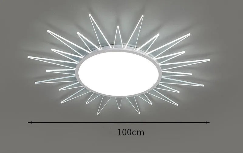 Modern circular aluminium LED ceiling lamp with remote control shown in room setting