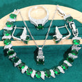 Bridal four-piece zircon jewellery set showing necklace, bracelet, earrings, and ring in alloy with water wave chain.