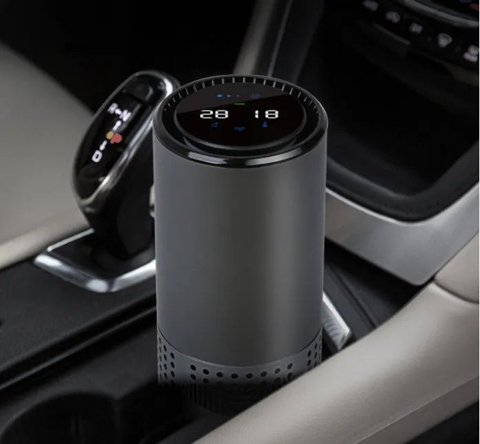 Aluminium alloy car air purifier cup with display, USB cable, and large filter for vehicle air cleaning.