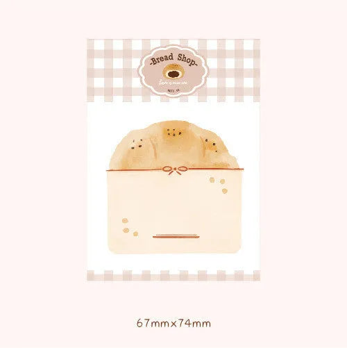 Food-shaped A5 notepad with bread, tomato, and yogurt designs, 85mm by 120mm.