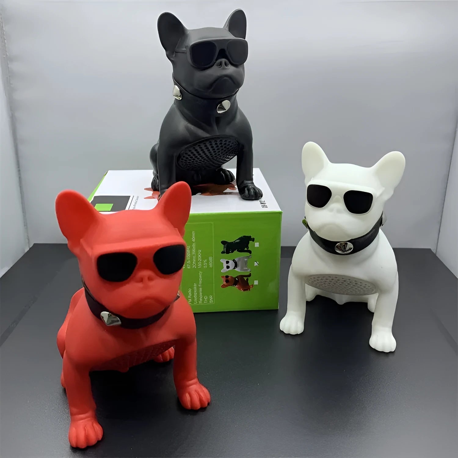 Mini full body bulldog-shaped Bluetooth speaker in black, red, or white colour.