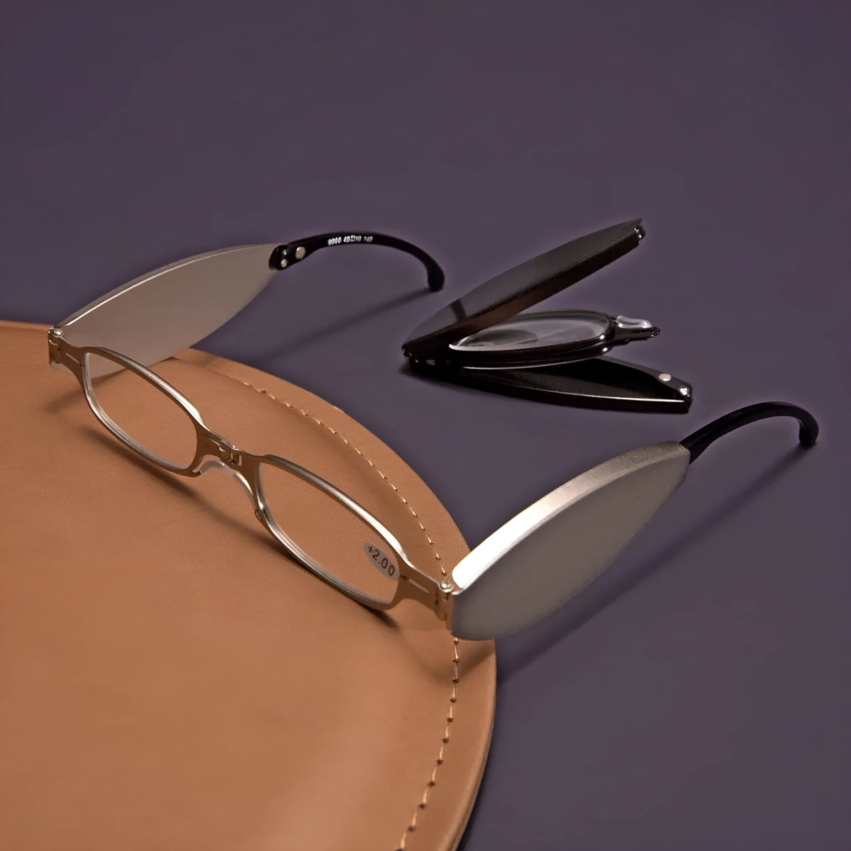 Black folding presbyopic reading glasses with retro ring temples, shown in open and closed positions.