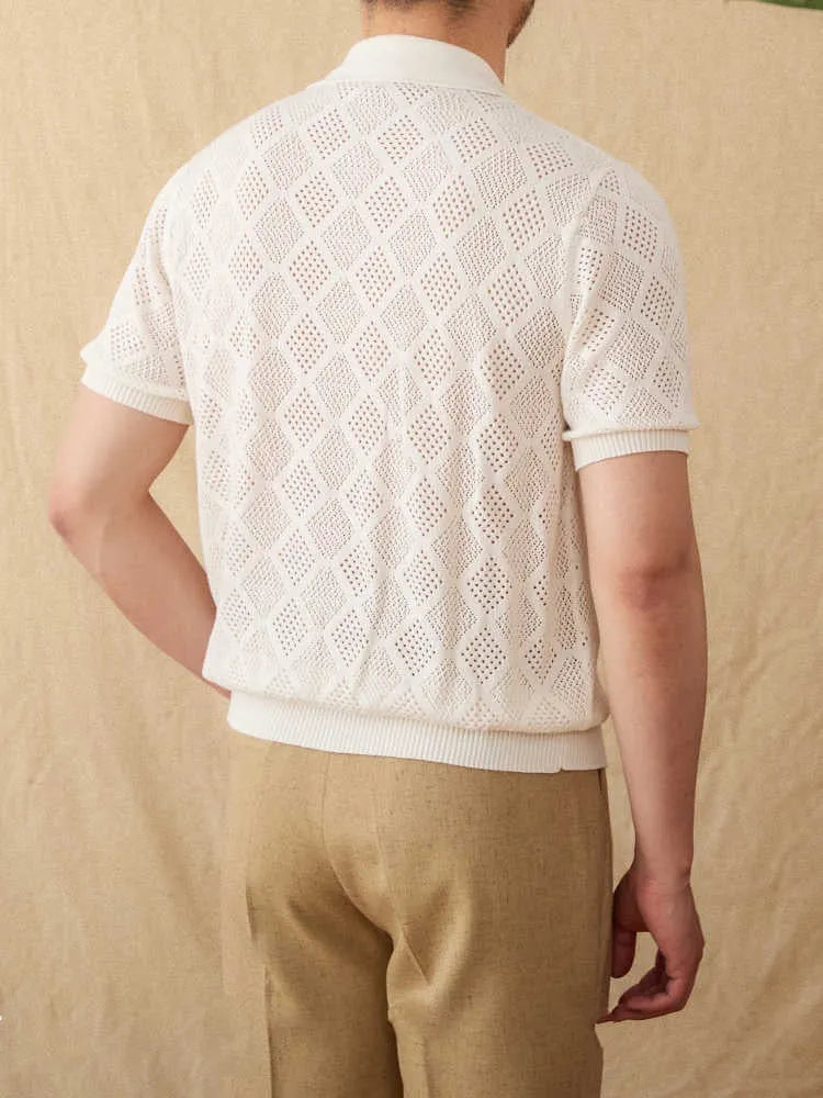 Light brown cotton cardigan with front zipper and short sleeves laid flat.