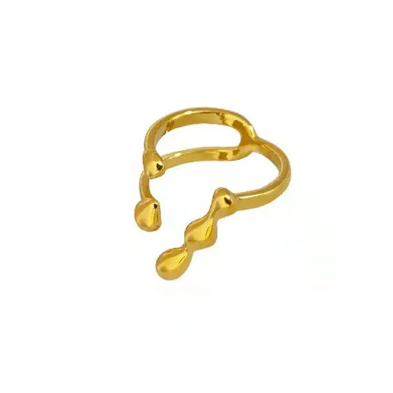 Brass opening ring with spherical elements in gold or silver finish