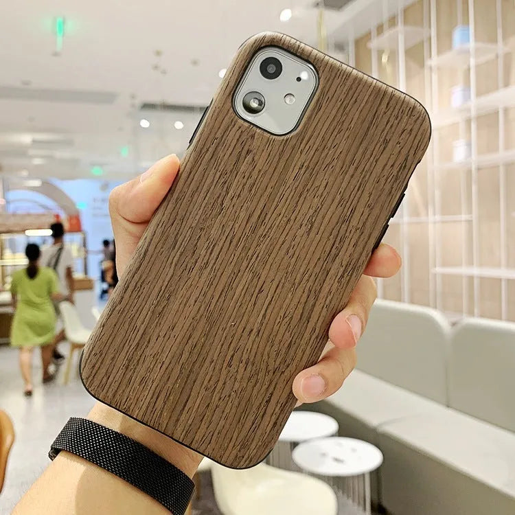 Wooden iPhone back cover in rosewood, teak, black rose and walnut finishes showing natural grain patterns