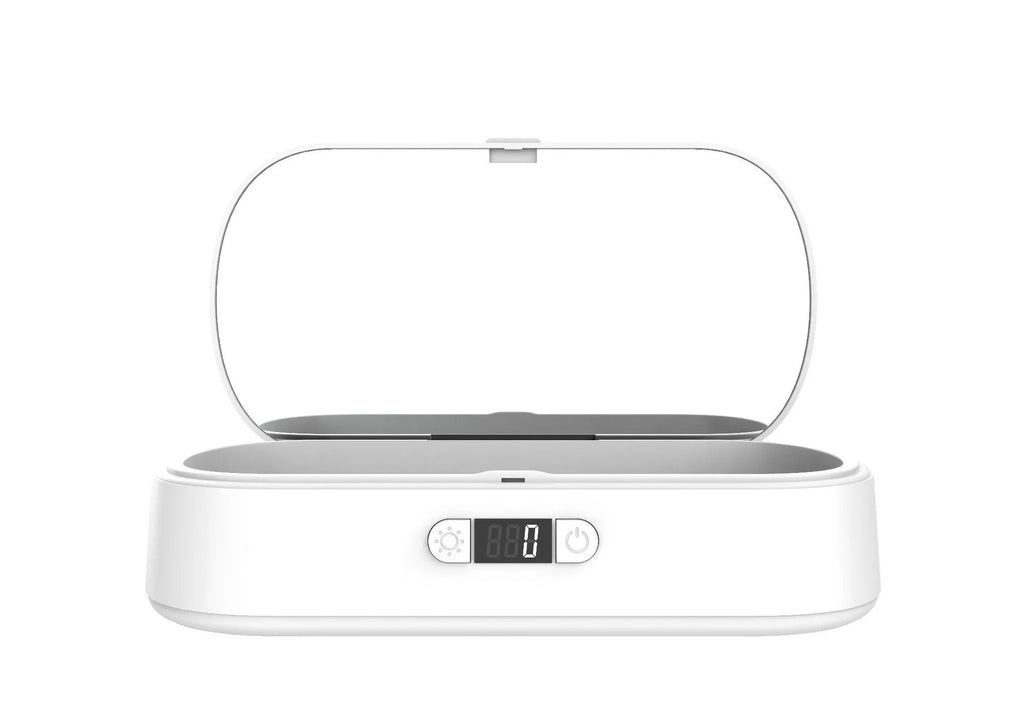 White ABS plastic UV steriliser box with wireless charging for phones and jewellery.