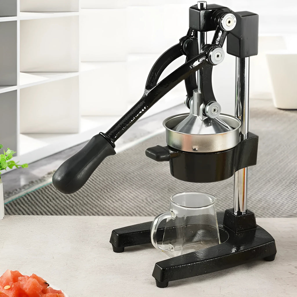 Black cast iron manual citrus juicer with stainless steel strainer, 40cm tall
