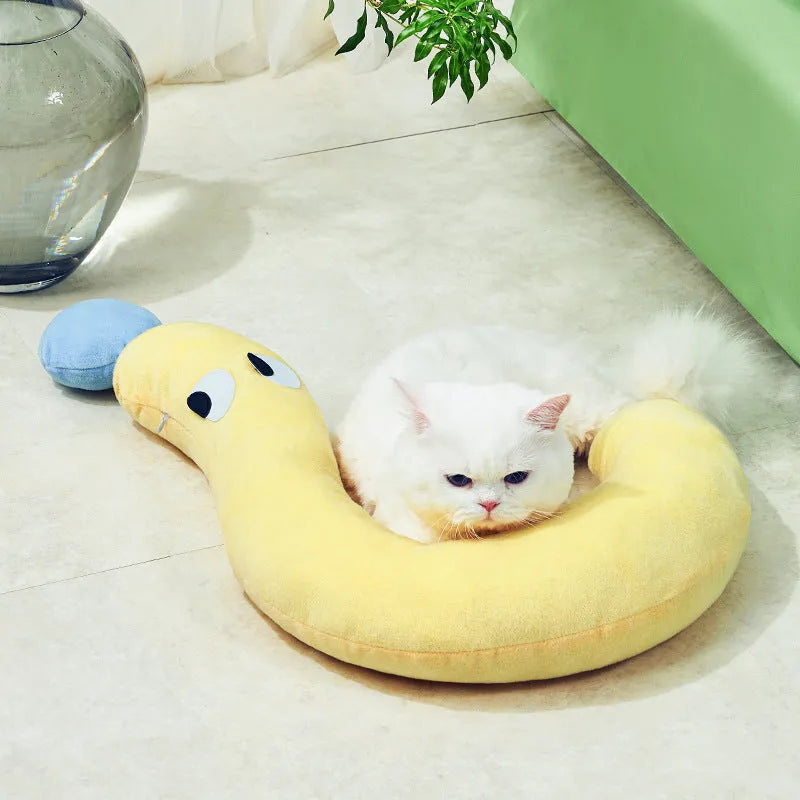 Blue and yellow rectangular pet sleeping pillow for cats and dogs, measuring 62 by 39 centimetres.