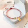 Hand-woven red rope women's bracelet with natural garnet or strawberry quartz crystal beads