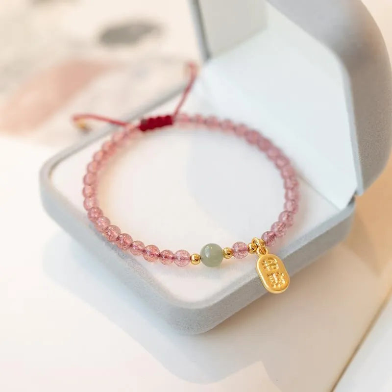 Hand-woven red rope women's bracelet with natural garnet or strawberry quartz crystal beads