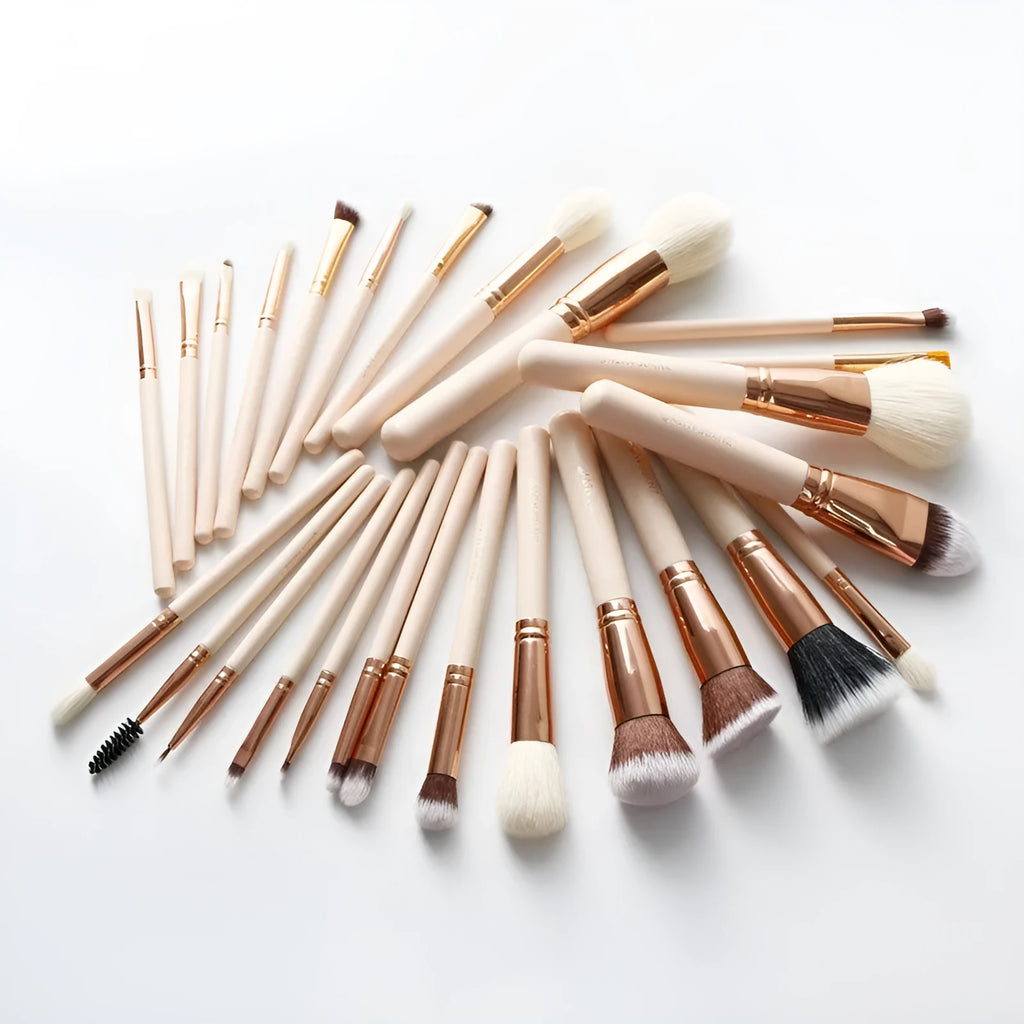 26-piece pink makeup brush set with wooden handles and a grey PU storage case, arranged open.