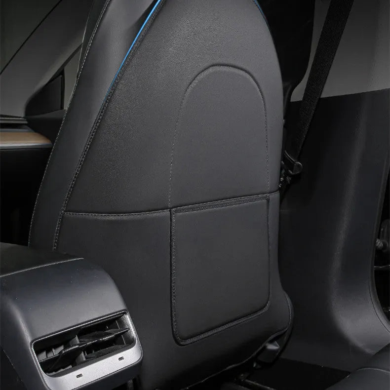 Two black leather motorcycle seat anti kick pads showing size and texture.