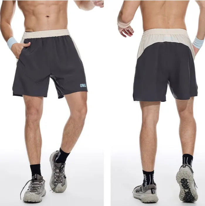 Men's loose grey workout shorts with elastic waist and lace-up closure for gym training