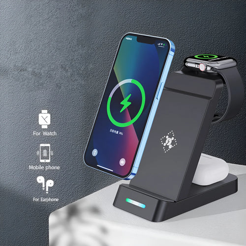 Black and white 3-in-1 wireless charging station for phone, watch, and AirPods on a desk