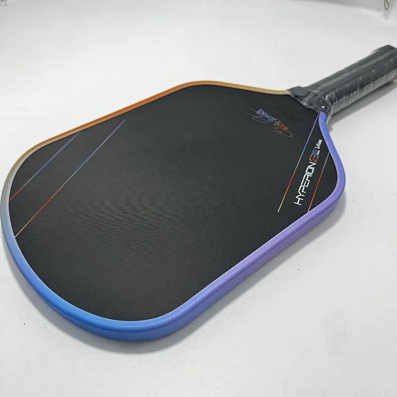 Aurora Hyperion 3s multi-colour matte pickleball racket showing carbon fibre construction.