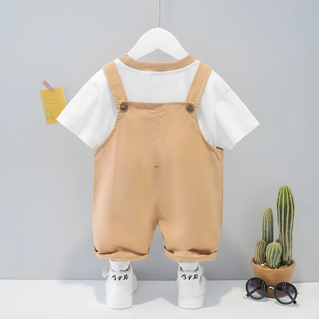 Baby wearing cotton summer overalls with cartoon print and adjustable straps