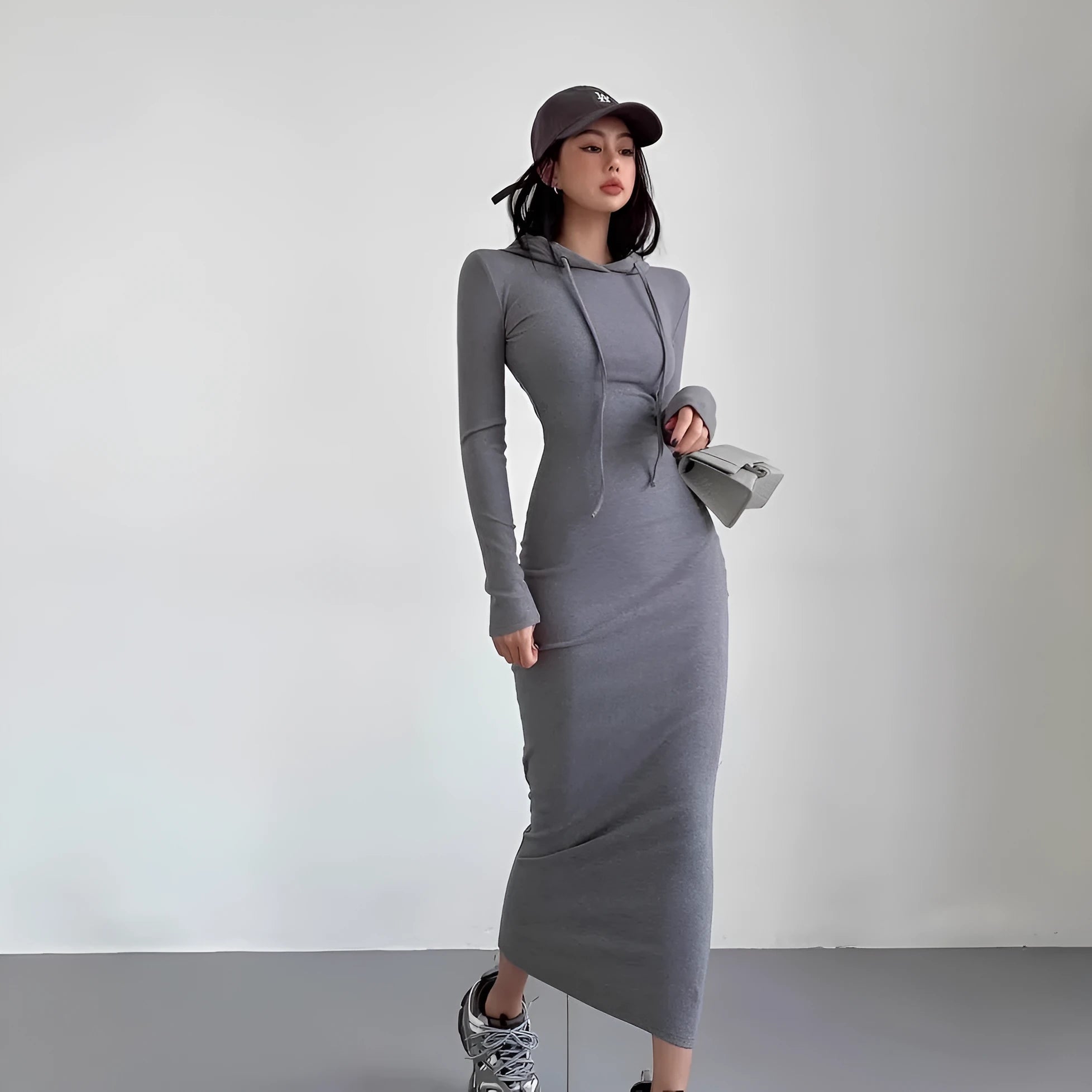 Women's hooded sheath dress in polyester with over-the-knee length and long sleeves