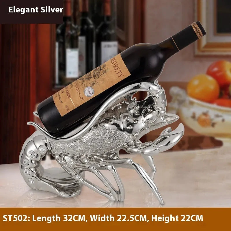 Lobster-shaped wine rack ornament in metallic rose gold or silver finish on display surface