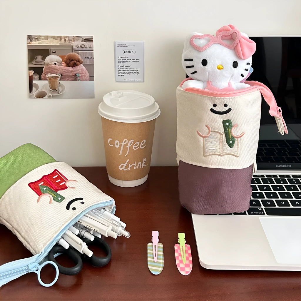 Brown Korean-style collapsible pencil case with Oxford fabric construction showing 17cm by 14cm dimensions