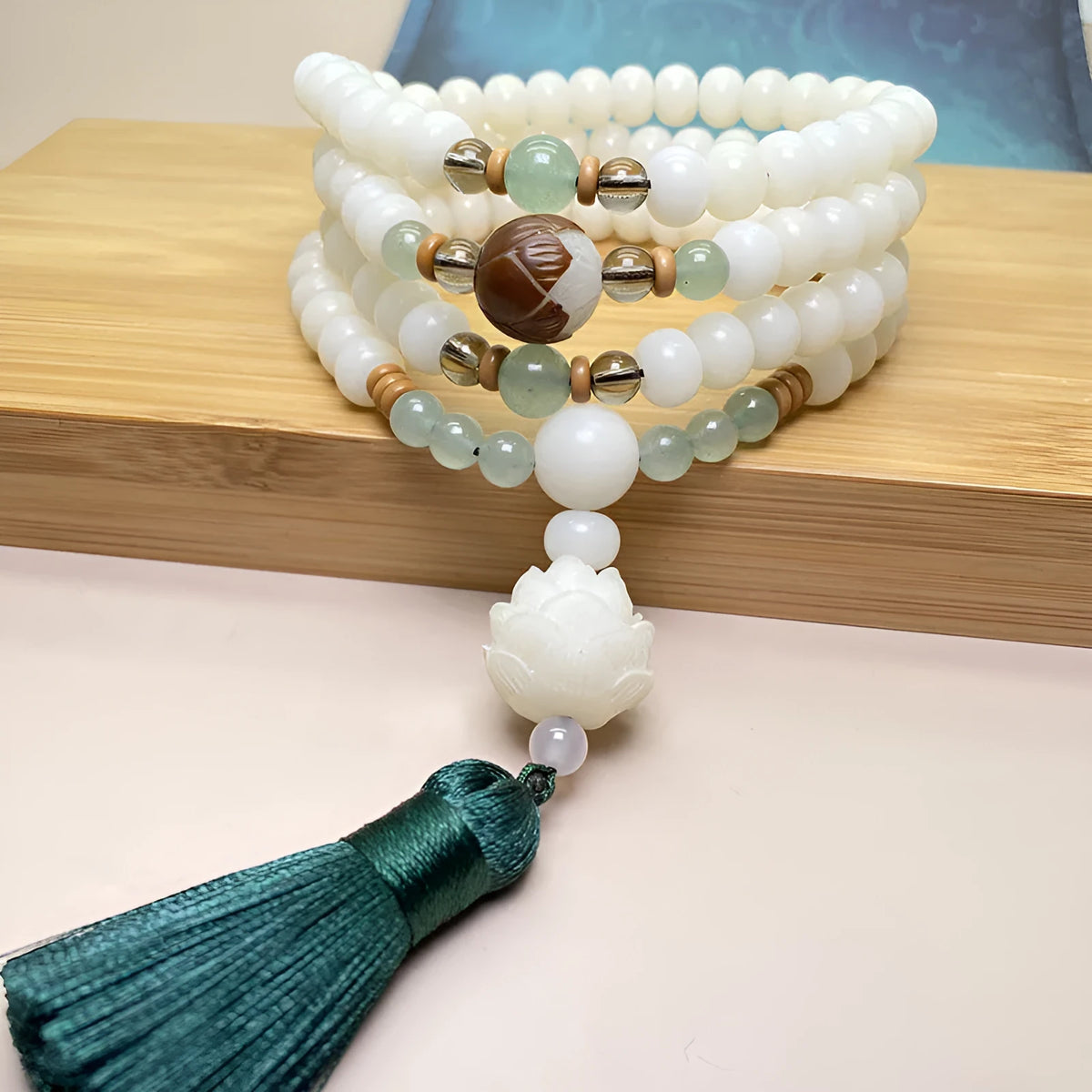 White jade bodhi bracelet with 108 beads showing three style pattern options and multiple bead sizes