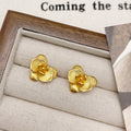 Retro-style flower earrings with petal details in gold or silver electroplated finish