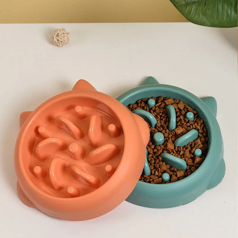 Bone shaped slow feeder dog bowl in green colour with raised internal obstacles