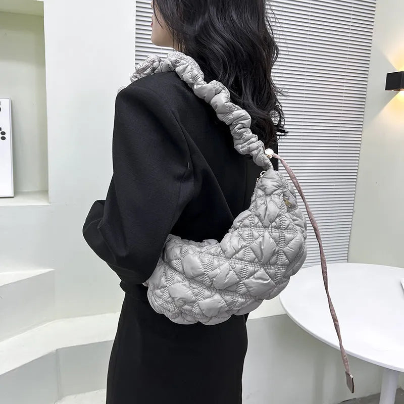 Women's casual nylon shoulder messenger bag in a solid colour with adjustable strap.