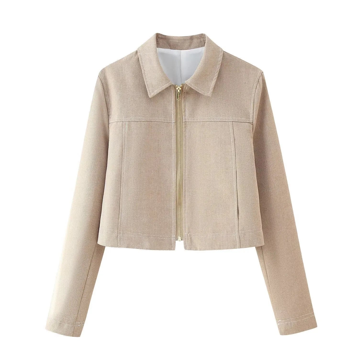 Women's light coloured herringbone pattern summer suit with jacket and straight-leg trousers, showing 3D pattern effect and embroidery details.