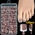 120 piece box of square short French style artificial toe nails with white tips on nude base.