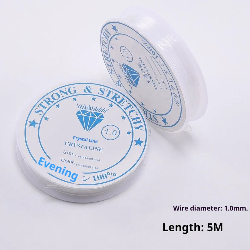 Spool of transparent white elastic fishing line for DIY jewellery and craft projects