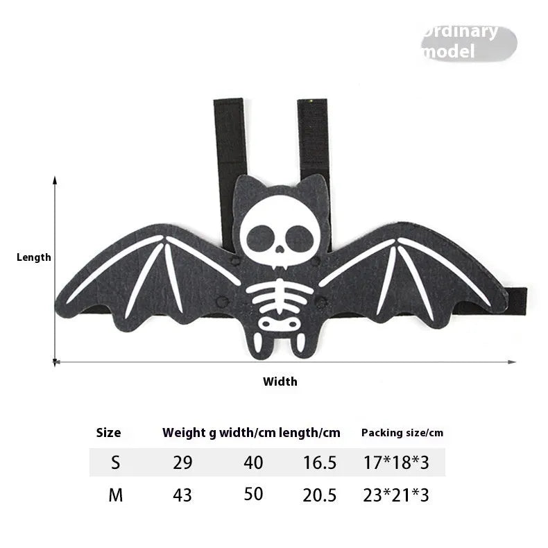 Halloween batwing cloak costume for a cat, made from black and orange felt.