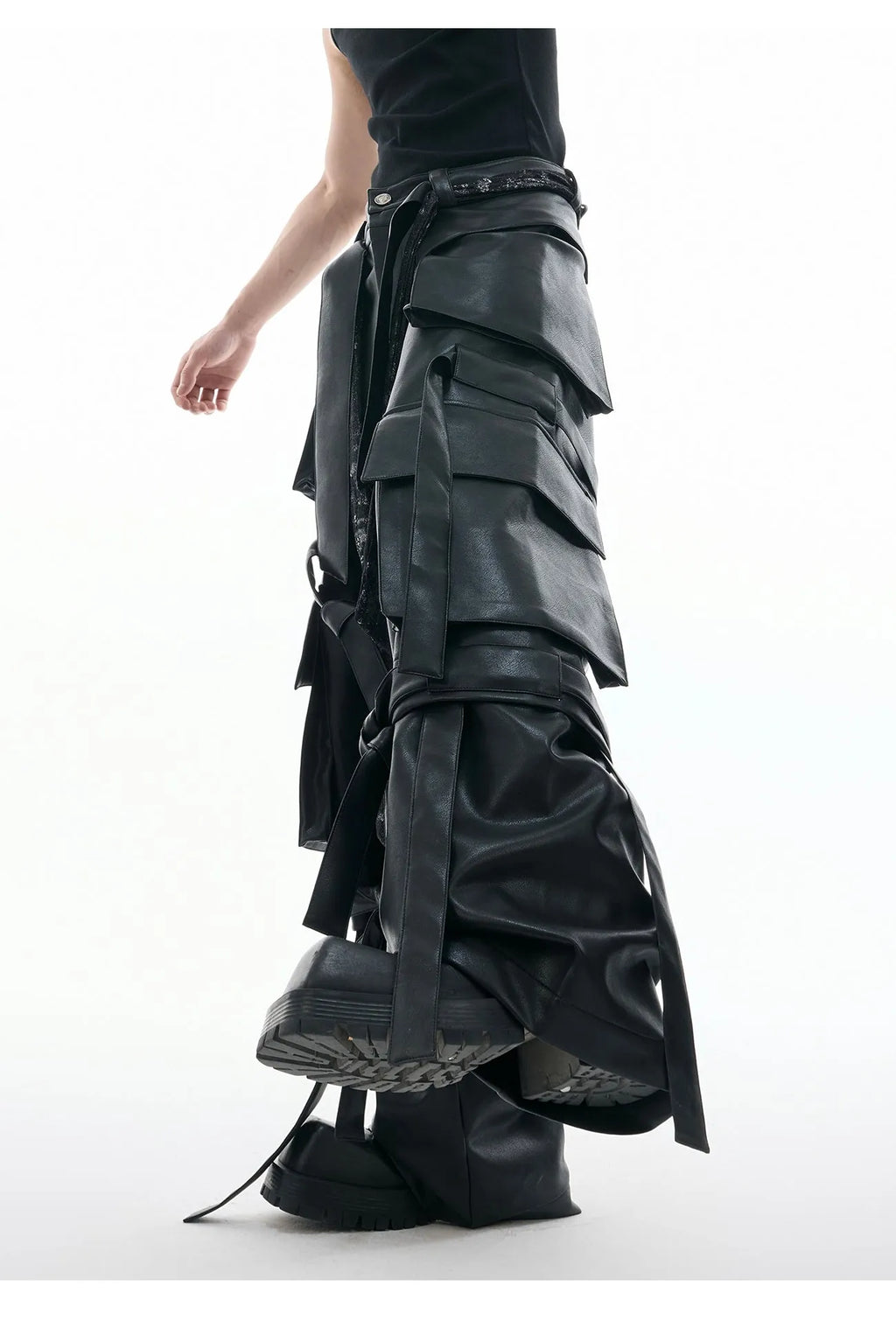 Black loose-fit quilted trousers with multiple pockets and stitching detail