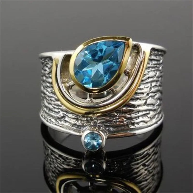 Women's creative Chinese style alloy ring with a drop-shaped inlaid blue rhinestone zircon.