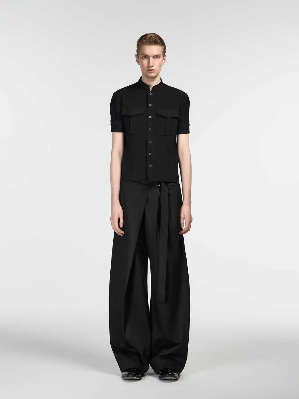 Black straight-leg trousers with single pleat front and adjustable mid waist